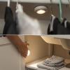 imageAmazon Basics LED Puck Lights Color Changing Battery Operated IR Remote 40 Lumens 2 Pack Wireless Stick on Lights Under Cabinet Lighting Ideal for Closets and More WhitePuck Light