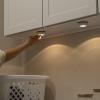 imageAmazon Basics LED Puck Lights Color Changing Battery Operated IR Remote 40 Lumens 2 Pack Wireless Stick on Lights Under Cabinet Lighting Ideal for Closets and More WhitePuck Light