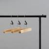 imageAmazon Basics Sturdy Wooden Pants Hangers  Natural 10PackNatural