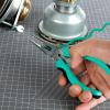 imageAmazon Basics Tool Set With Easy Carrying Round Pouch 104Piece Turquoise 144 x 114 x 3 inchesTurquoise