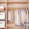 imageAmazon Basics Durable Wooden Suit Clothes Hangers  Cherry 20PackNatural