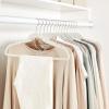 imageAmazon Basics Slim Velvet NonSlip SpaceSaving Suit Clothes Hangers Pack of 100 IvoryBeigeIvoryBeige