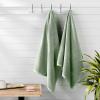 imageAmazon Basics Cotton Washcloths QuickDry 12quot x 12quot 12Pack WhiteSeafoam Green