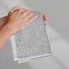 imageAmazon Basics Fast Drying Cotton Washcloths for Bathroom Machine Washable Soft and Absorbent 12 x 12 in White 60 PackGray