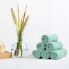 imageAmazon Basics Fast Drying Cotton Washcloths for Bathroom Machine Washable Soft and Absorbent 12 x 12 in White 60 PackSeafoam Green