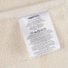 imageAmazon Basics NonSlip Cotton Bath Mat 100 Cotton Absorbent Machine Washable 31quot L x 20quot W Bright WhiteCream