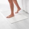 imageAmazon Basics NonSlip Cotton Bath Mat 100 Cotton Absorbent Machine Washable 31quot L x 20quot W Bright WhiteWhite
