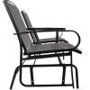 imageAmazon Basics 2Person Outdoor Patio Textilene Glider Chair with Tempered Glass Table 303quotD x 565quotW x 362quotH BlackBlack