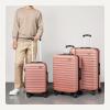 imageAmazon Basics 3Piece Set 21quot 26quot 30quot Hardshell Suitcases With Wheels Expandable For Up to 25 More Space With ScratchResistant Surface Four Multidirectional Wheels Light BlueRose Gold