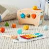 imageAmazon Basics Musical Pounding Bench With Xylophone and Shape Sorter ToyKids Gift for Toddlers Age 18M Boy Girl Baby 116 x 52 x 63 inches Multicolor