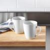 imageAmazon Basics Porcelain 12 oz Coffee Mug Set 12 Count White Previously AmazonCommercial brand