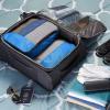 imageAmazon Basics Small Packing Cubes for Travel Packing Organizers 4PieceSet With Double Zipper Pulls and Mesh Top Panel 100 Durable Polyester Black 11quotL x 68quotW x 3quotHBlue