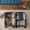imageAmazon Basics Small Packing Cubes for Travel Packing Organizers 4PieceSet With Double Zipper Pulls and Mesh Top Panel 100 Durable Polyester Black 11quotL x 68quotW x 3quotHGray