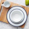 imageAmazon Basics 16Piece Cafe Stripe Kitchen Dinnerware Set Plates Bowls Mugs Service for 4 BlackBlue