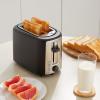imageAmazon Basics 2 Slice Toaster With 7 Browning Settings Extra Wide Slots For Bagels and Special Breads Removable EasytoClean Crumb Trays CancelDefrostBagel Buttons 800W Black ampamp Silver2 Slice