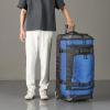 imageAmazon Basics 30Inch Large Rolling Duffle Bag with Wheels and Handle Travel Duffle Bag with Durable Ripstop Polyester Material 2 Layers of Space Multiple Interior and Exterior Pockets BlackBlue