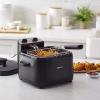 imageAmazon Basics 32Qt 30L Deep Fryer with 12Cup Oil Capacity Adjustable Temperature Easy Draining Basket Stainless Steel Exterior Viewing Window 1500W Black ampamp Silver21Qt  Black