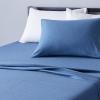 imageAmazon Basics 4 Piece Bed Sheet Set 100 Cotton Jersey Includes Super Soft Flat and Fitted Sheets Pillowcase Queen Light Gray SolidChambray