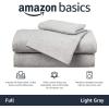 imageAmazon Basics 4 Piece Bed Sheet Set 100 Cotton Jersey Includes Super Soft Flat and Fitted Sheets Pillowcase Queen Light Gray SolidLight Gray