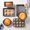 imageAmazon Basics 6 Piece Nonstick Carbon Steel Oven Safe Bakeware Set with Cake Muffin Cookie and Loaf Pans 6 Piece 1625 x 1175 x 625 inches1625 x 1175 x 625 inches