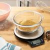 imageAmazon Basics Digital Kitchen Scale with LCD Display Batteries Included Weighs up to 11 pounds Black and Stainless Steel