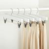 imageAmazon Basics Durable Wooden Pants and Skirt Hangers with Clips  White 10PackWhite