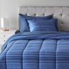 imageAmazon Basics FullQueen Comforter Set with Sheets 7Piece Navy with Grey Plaid Bedding Lightweight Microfiber BedinaBagBlue Calvin Striped