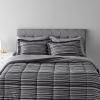 imageAmazon Basics FullQueen Comforter Set with Sheets 7Piece Navy with Grey Plaid Bedding Lightweight Microfiber BedinaBagGray Calvin Stripe