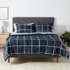 imageAmazon Basics FullQueen Comforter Set with Sheets 7Piece Navy with Grey Plaid Bedding Lightweight Microfiber BedinaBagNavy With Grey Plaid
