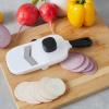 imageAmazon Basics Handheld Mandoline Slicer White 113quot X 45quot X 25quot