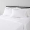 imageAmazon Basics Lightweight Super Soft WrinkleFree Easy Care Microfiber 4Piece Bed Sheet Set with 14Inch Deep Pockets Full Bright White SolidBright White