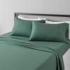 imageAmazon Basics Lightweight Super Soft WrinkleFree Easy Care Microfiber 4Piece Bed Sheet Set with 14Inch Deep Pockets Full Bright White SolidEmerald Green