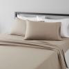 imageAmazon Basics Lightweight Super Soft WrinkleFree Easy Care Microfiber 4Piece Bed Sheet Set with 14Inch Deep Pockets Full Bright White SolidTaupe