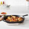 imageAmazon Basics PreSeasoned Cast Iron Skillet Oven Safe Even Heating HeavyDuty ampamp Large 15Inch Black15