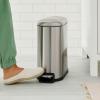 imageAmazon Basics Rectangular Small Trash Can with Lid and SoftClose Foot Pedal for Bathroom Bedroom Living Room Office Smudge Resistant 20l  53 gallon NickelSilver
