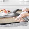 imageAmazon Basics Silicone Rectangular Baking Mat NonStick Reusable Oven Bakeware 165quot x 116quot New BeigeGray Pack of 2BeigeGray