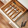 imageAmazon Basics Silverware Set Stainless Steel Flatware Dishwasher Safe Service for 4 20Piece Forks and Spoons Round Edge20Piece