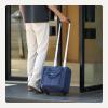 imageAmazon Basics Underseat Carry On Luggage with Wheels  14quot Rolling Travel Bag BlackNavy