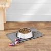 imageAmazon Basics Waterproof AntiSlip Silicone Cat ampamp Dog Food Mat Pet Mats with Raised Edges for Food and Water Bowl to Protect Floors 185 x 115 Inches Gray SolidGray