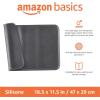 imageAmazon Basics Waterproof AntiSlip Silicone Cat ampamp Dog Food Mat Pet Mats with Raised Edges for Food and Water Bowl to Protect Floors 185 x 115 Inches Gray SolidBlack
