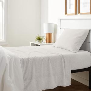 imageAmazon Basics 4 Piece Bed Sheet Set 100 Cotton Jersey Includes Super Soft Flat and Fitted Sheets Pillowcase Queen Light Gray SolidOatmeal