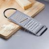 imageAmazon Basics Cheese Grater with Handle Stainless Steel Zester Rectangular NonSlip Multifunction Tool for Kitchen Prep Black Previously AmazonCommercial brand