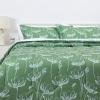 imageAmazon Basics Lightweight Microfiber Comforter Sets 7 Pieces Navy Geometrics FullQueenFloral Motifs in Green Background