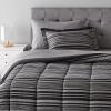 imageAmazon Basics Lightweight Microfiber Comforter Sets 7 Pieces Navy Geometrics FullQueenGray Calvin Stripe