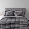 imageAmazon Basics Lightweight Microfiber Comforter Sets 7 Pieces Navy Geometrics FullQueenGray Calvin Stripe