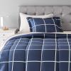 imageAmazon Basics Lightweight Microfiber Comforter Sets 7 Pieces Navy Geometrics FullQueenNavy With Grey Plaid
