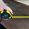 imageAmazon Basics SelfLocking Tape Measure MID Accuracy 16Feet 5Meters Black YellowBlack  Yellow