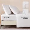 imageAmazon Basics Cationic Microfiber 4Piece Sheet Set Wrinkle Free and Easy Fit 1 Flat Sheet 1 Fitted Sheet and 2 Pillowcases Queen GreyWhite