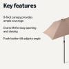 imageAmazon Basics Patio Umbrella Crank Lift and Push Button Tilt 9 Foot NavyTan