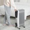 imageAmazon Basics Portable Oil Radiator Heater for Indoor Use 3 Heat Settings OverHeat Protection ETLcertified Safety 7 OilFilled Steel Fins 1500W 11quotD x 148quotW x 252quotH WhiteWhite